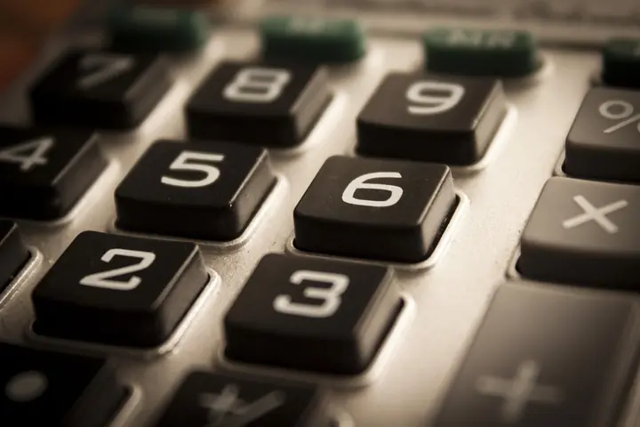 Close-up of the numeric keypad of a desktop calculator.